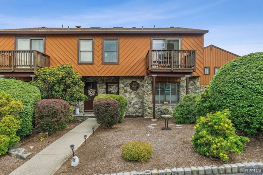 Beautiful, meticulously maintained, move-in ready 1724 SF townhouse in Brookside Heights. This immaculate End Unit features an EIK w quartz sink, ceiling fan & ss appliances less than a year old, microwave & range w air fryers, DR, LR w Neiman Marcus gas fireplace, & view to scenic deck w gas line for gas grill. Upstairs hall has Casablanca ceiling fan, skylights w remote control shades & beautiful updated FB w soaking tub. Large primary BR ensuite also has gorgeous updated FB & stall shower & deck for early morning coffee. 2nd large BR also has wonderful deck. Attic has pull down stairs, fan & wood floor for storage. Finished basement has powder rm, decorative ceiling tiles, heat & AC & closet. Nothing in the home is original, the roof was replaced a month ago, decks have just been power washed & stained & home has a Budd central vacuum system. Enter through front or rear storm doors or one car garage. Ready for new family to love this gorgeous home. This won't last long!