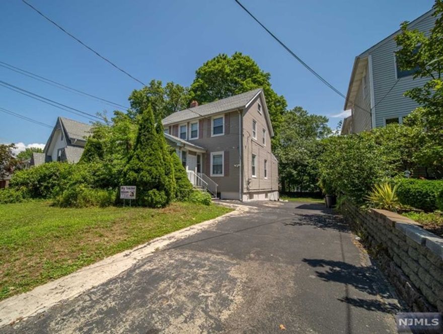 Recently renovated four bedroom and three full bath colonial style home in a extravagant location of Leonia. Property size is unmatched at 50x200 lot with an incredibly spacious and serene backyard at your disposal. Each floor of the home has a full bath making the home convenient for any type of family that will reside in the home. If four bedrooms are not enough, the home features a spectacular finished attic for all sort of use plus another bedroom in the basement. Quality hardwood flooring has been installed through the house along with a fully finished basement. Top of the line wall A/C units have been installed as well making the utilities even more efficient. The home is several steps from the Leonia Middle School, restaurants, shopping and NYC transportation making its location a phenomenal one. Contact listing agent, Ray Park, directly at 2.0.1 674 - 7 2 2 1