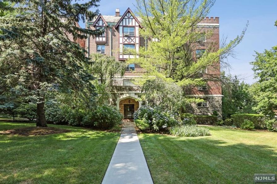 Welcome home! This beautiful pre-war Tudor complex is not to be missed. The private and park-like property features mature landscaping and charming pathways. Located on the 2nd FL with courtyard/garden views you will find high ceilings, hardwood floors and a wood burning fireplace. Entering into the unit entry foyer we feature one full bathroom, one bedroom with duel step in closets, newer kitchen with granite countertops and an open living room with a wood burning fireplace. Located just one block from downtown Englewood you'll have easy access to shops, restaurants, cafes and Bergen PAC theater. NYC transportation is just outside your door. Parking, storage unit, gym, and laundry onsite.