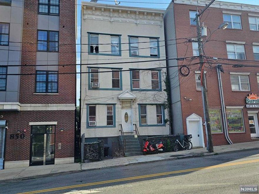 Great opportunity to Developer or to Own an Investment Property with 100% Tenant Occupied 3 Story Building