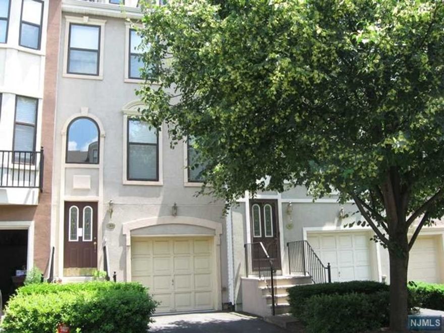 Lovely Brownstone in desirable Cambridge Heights with 2 bedrooms & 2.5 baths only 9 miles from NYC. Open kitchen with breakfast bar and pergo floors, lower level family rm walk out to private patio, gas fireplace, spacious master bedroom with cathedral ceiling and master bath with whirlpool tub, separate shower and double sink vanity. Laundry conveniently located on BR level. Enjoy all Cambridge Heights has to offer: pool, clubhouse, exercise room, tennis courts, jogging path, playground and luxury of maintenance free living steps from NYC bus, movie theater, shopping & restaurants. EZ access to highways.