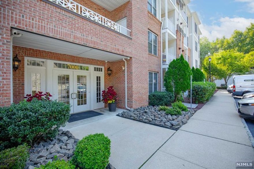 For more information on this home please contact Kim Damion- 240-620-5811 Discover luxury in this ground-level condo at The Grande, offering easy access without stairs or elevators. The open layout features glistening hardwood floors throughout. The gourmet kitchen, equipped with custom cabinetry, stainless steel appliances, a stone backsplash, and granite countertops, is perfect for casual meals or entertaining. The sunlit living room extends to a private patio with direct access to a landscaped courtyard, complete with pergola seating and BBQ grills. The spacious primary bedroom, with its courtyard views, offers direct access to this serene outdoor space. A second bedroom, ideal for guests or a home office, completes the unit. Situated in a vibrant neighborhood, you're just moments away from premier shopping and dining. Contact us today to schedule a private tour and make this exceptional condo your new home.