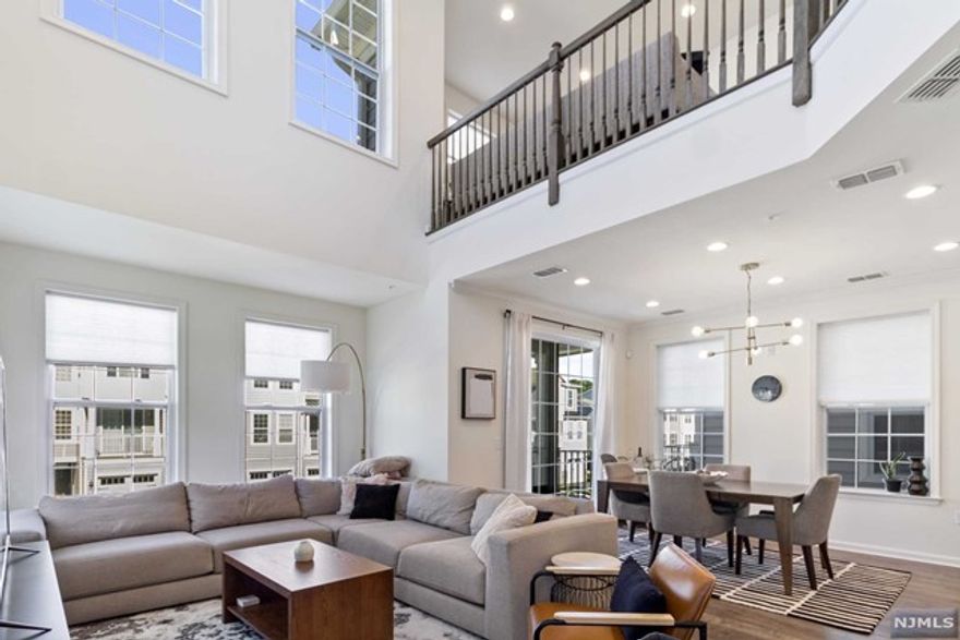 Located on a quiet cul-de-sac, this gorgeous end unit Yale model townhouse, is located in the newly constructed Hilltop at Cedar Grove luxury community! The 2nd floor has soaring windows and lofted ceilings that bring in tons of natural light. The open floor plan includes a spacious kitchen with stainless steel appliances, granite countertops, and tons of cabinet space. The kitchen opens to a dining room that is just steps from the private balcony. Also conveniently located on this level is a massive pantry and half bathroom. The third floor features 3 spacious bedrooms including a primary bedroom suite that has a full bathroom and a huge walk in closet. Rounding out the third floor is a laundry room, additional storage space, and a loft area that is the ideal office, second living room or play room. There is a shuttle in the Hilltop Community with direct access to NYC via NJ Transit train. The community clubhouse has a pool, outdoor area, kitchen, gym and so much more!