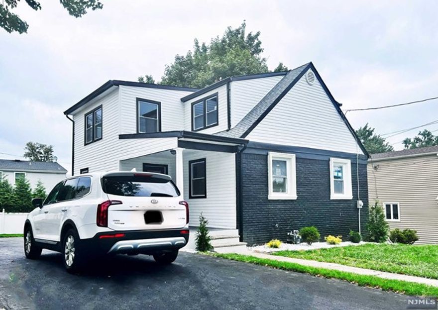 Welcome Home to this fully renovated 4 bedroom 2.5 bath stunner! No expense was spared on this renovation making it feel like new construction. Featuring New Bamboo Flooring, fully upgraded Electrical and Plumbing, New HVAC, Water Heater, all New windows throughout, New Roof, Newly Paved Driveway and a Fully Finished Basement. A beautiful brand new 14x20 deck that looks out onto a newly sodded yard. Great place to rent and call Home!