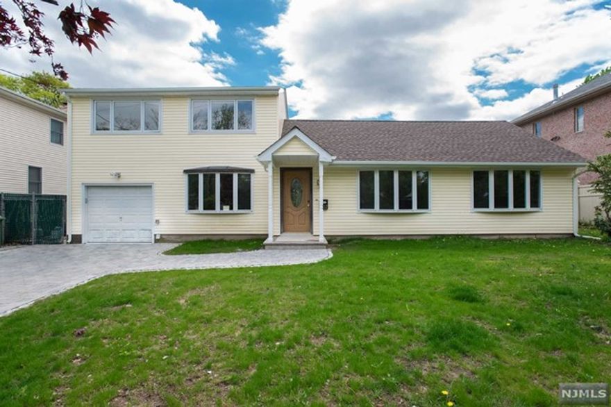 Great opportunity to rent in Paramus near top-rated schools, shopping, major highways, and an easy commute to NYC. This spacious home offers a formal living room and a nice size dining room connecting the newly remodeled modern eat in kitchen, which overlooks to a beautiful backyard. First floor is completed with family room and master suite. The second floor offers two additional bedrooms and a full bathroom. Attached garage. Must See!!!! Tenant is responsible for first $200 repairs, lawn care, and snow removal. Interview and credit check is required.