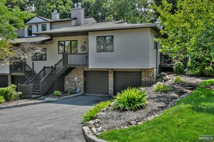 LOCATION-LOCATION! 2 Bedroom end-unit with private backyard. Modern eat-in kitchen features granite countertops, fireplace and sliders to a deck with conveniences for a bistro table and barbeque. Expansive family room offers sliders to a private, large deck for alfresco dining or relaxing! This is a one floor unit with master bedroom, master bath, and a second bedroom and full bath. Basement is finished with a large full bath and spa, family room w/ bar, and a bonus/bedroom. New air conditioning unit. Amenities inc: tennis courts, basketball court, playground. Pet friendly complex! Plenty of storage and closets. Blue-ribbon school system. Easy access to center of town with restaurants and shops. Enjoy the Ramsey Farmer's Market and beautiful Finch Park with basketball courts, baseball fields and playground. Train Station in town!