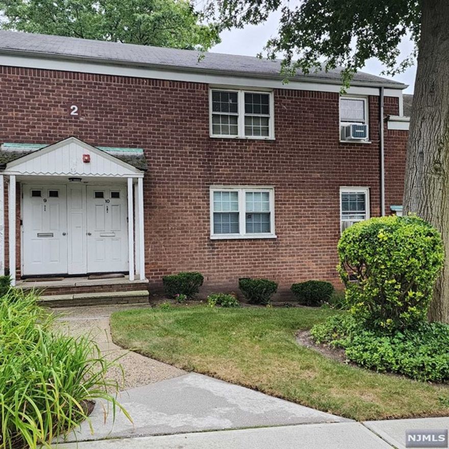 Desirable East Hill condominium complex offers second floor unit. Large living room with dining area, kitchen, bedroom with 2 closets and full bath. There are hardwood floors under the carpet. 80% coverage is required by the association. Move in condition. Great alternative to NYC living, New York transportation is right on the corner. Close to houses of worship and lovely downtown Englewood, with shops, restaurants, library and more. Grounds are well kept year round. Great option for investors as well, easy to rent right away. (Buyer will have the following added costs at closing: a $150 move-in fee, 3 months' maintenance contribution to the reserve account.) 1 dog is allowed only for owner. Renter cannot have a dog. Strictly AS-IS.