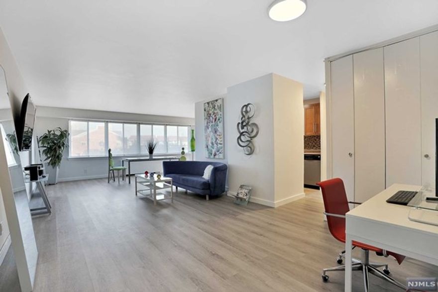 3rd Floor Living Space! Move right this inviting, sun-filled and spacious 2 bedroom, 2 full bath apartment home with partial river views from balcony/bedroom conveniently nestled in a 24hr gated, riverfront development in Edgewater, New Jersey known as Hudson Harbour Condos. This 24hr doorman hi-rise tower boasts an elevated outdoor pool, tennis court, play space, park like sitting area and so much more. This uniquely designed space features an enormous wrap around terrace, spacious rooms, galley kitchen, modern baths, premium vinyl flooring throughout and six closets. Monthly maintenance includes ALL utilities, 24hr doorman/guardhouse, cable/internet package, outdoor pool, tennis court, play area & fitness room. One outdoor parking space included in sale as an assignment. Seller is licensed Realtor. Truly A Must See!