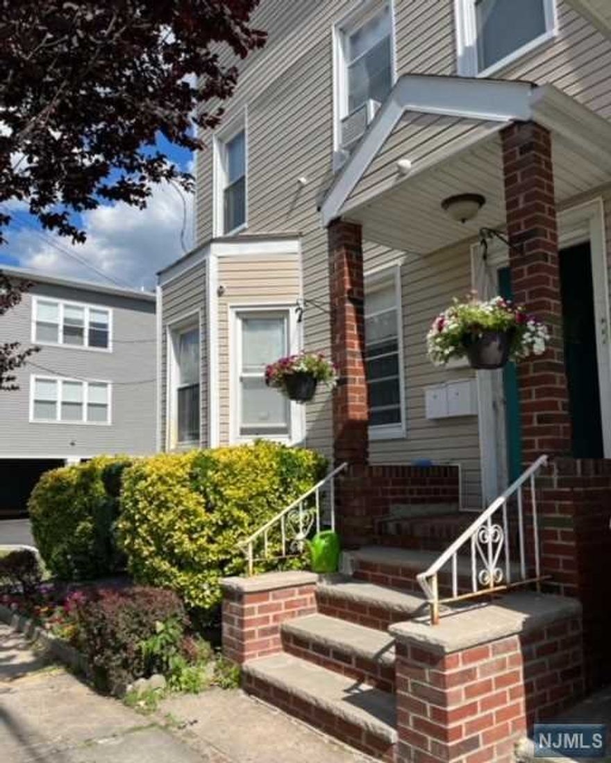 Welcome home to a MOVE IN Ready 1st Floor apartment. The unit boasts a Large BR w/deep closet, Eat in Kitchen & Renovated Bathroom w/Shower Stall. Shared use of the back yard & COLD water are included. Street Parking only. NO PETS. No Smoking in the apartment. The Mill Shoppes Of Garfield are close by & easy access in Manhattan via BUS