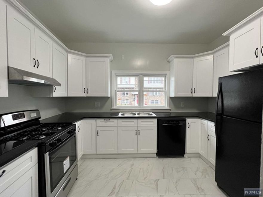 Newly renovated two-bedroom apartment with a bonus room, first floor showcases sizeable living room, brand new kitchen with all brand new appliances, storage room, brand new flooring. 2nd floor offers two bedrooms, bonus room and one full bathroom, all hardwood floor throughout. All new windows. Water is included in rent. Street parking. Convenient buses and train to NYC. Credit 700+ and income verification is required.