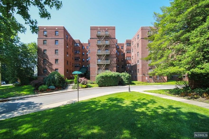 Welcome to Hudson Terrace Coop, conveniently located near George Washington Bridge in Fort Lee, NJ. This top-floor, corner unit offers two bedrooms, one bathroom, a spacious living/dining room, and a kitchen. Plenty of windows for natural lights, hardwood floors, new paint, and assigned parking. The low HOA includes property tax, heat, and water. Near Manhattan Express bus, close to parks and major highways.