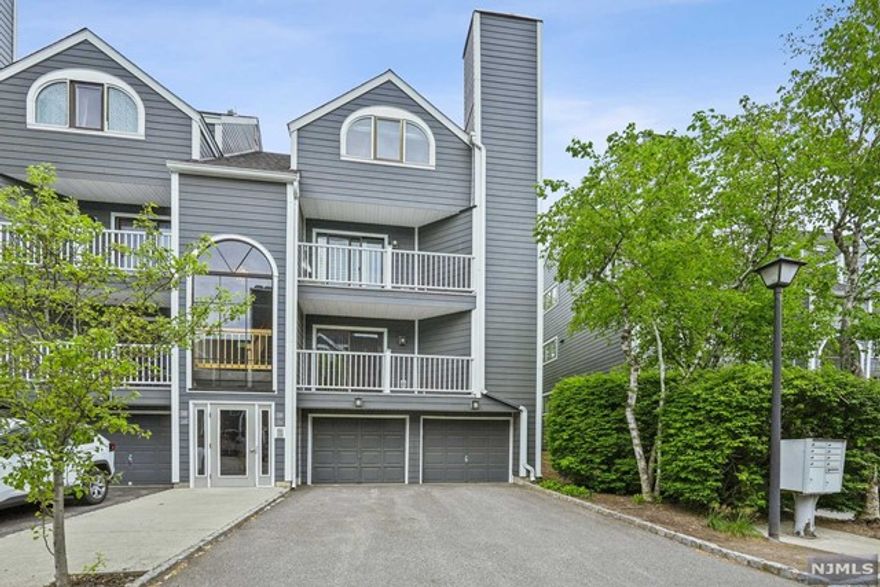 Welcome to your dream condo living! This stunning two-story, 4-bedroom, 2-bathroom unit includes a 1-car attached garage and is the epitome of modern comfort and style. As you step inside, you're greeted by open concept layout seamlessly connecting the living, dining, and kitchen areas. Whip up culinary delights in the well-appointed kitchen, complete with sleek appliances and ample storage space. Cozy up to the the warmth of a gas fireplace, perfect for evenings with loved ones. The elegant wood floors throughout the home add a touch of sophistication and are both durable and easy to maintain. The first floor also has a bedroom, full bathroom, and laundry. Upstairs, you'll find three generously sized bedrooms, ample closet space, and the second full bathroom. Other features include a covered balcony, updated mechanicals, and parking for three cars. Don't miss out on the opportunity to make this your new home! Schedule your private tour today before it's too late!