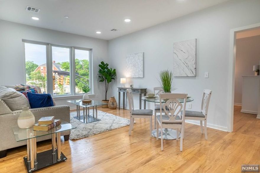 Presenting an exquisite condominium on Bloomfield Ave with over 1000 sq. ft. of space blending comfort and functionality. The modern interior sets the tone as soon as you enter. The open-concept living area flows from the living room to a sleek kitchen, perfect for both relaxing and entertaining. The kitchen features top-tier appliances, stylish cabinetry, and ample countertops.Two spacious bedrooms offer tranquility.The primary includes an en-suite bath for a serene retreat. The second bedroom is versatile for guests, office, or personal use. Both baths have contemporary fixtures for a spa-like feel. Large windows flood the space with natural light.With transportation nearby, commuting to Manhattan or NJ is a breeze.Don't miss your chance to own urban luxury.This home qualifies for CCM Community Promise loan products with down payment assistance.