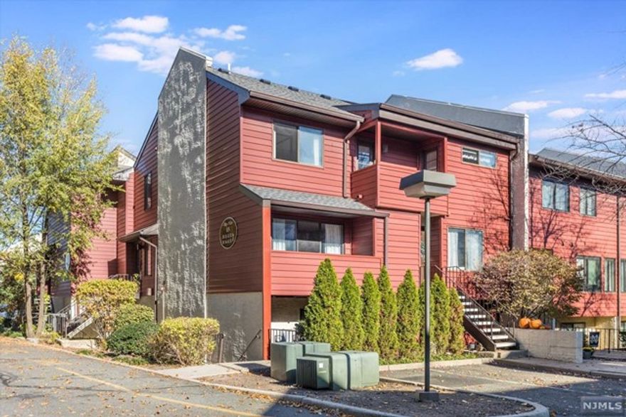 Spacious corner unit with two floors of living space! First floor offers a kitchen, dining area, powder room and great size living room with sliders to private porch. Second floor has primary bedroom with great closet space, high ceilings and its very own balcony! Rest of floor has second bedroom, full bathroom with stackable laundry units, and pull-down stairs that lead to attic with strong potential of functional loft. A very convenient location with NY bus stop directly in front of complex, a short distance to Nutley's ON3 Complex including Hackensack Medical School, minutes to Clifton Commons with restaurants and shopping, seconds to Route 21/3, and a jitney ride away to Delawanna train station. Unit is move in ready. This could be your time to own your own HOME!