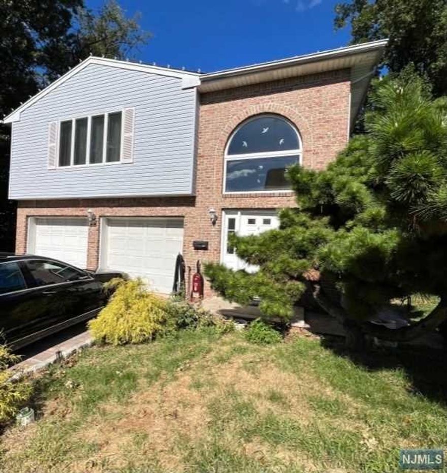 Totally Renovated 1st Floor apartment featuring hardwood floors, new kitchen and bath, laundry in unit, one car parking. Absolutely no pets. Use of the backyard/