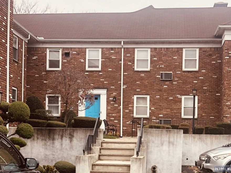 Large one bedroom condo at Arlington Estates featuring a large living room, eat-in kitchen. Coin operated laundry room in basement. Rent includes, 1 parking space, heat, hot water, parking, snow removal and general maintenance of property. Convenient location close to shopping and transportation.