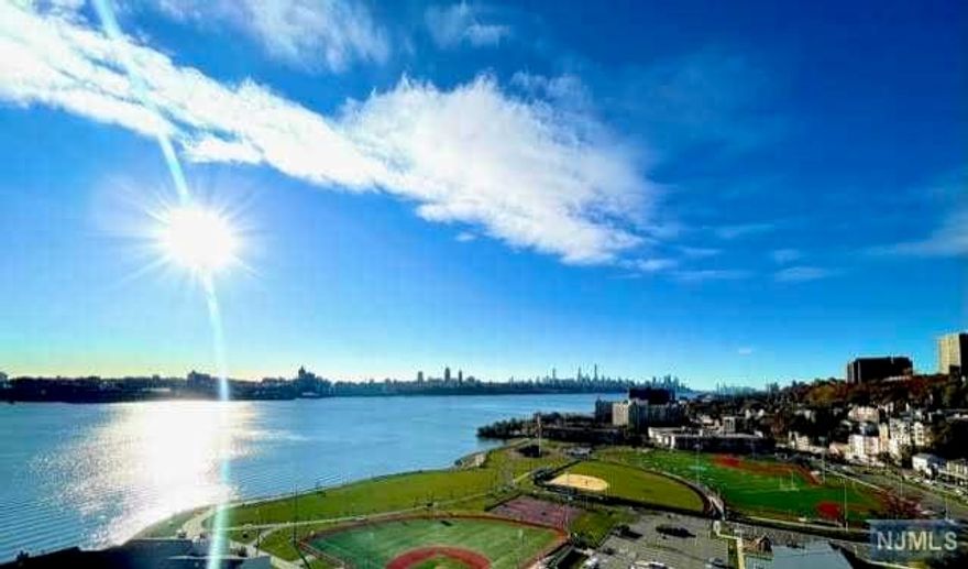 Proudly presenting this absolutely stunning Junior penthouse suite in the sky boasting breathtaking views of the NYC skyline and the Hudson River from the bedroom, living room & enormous glass balcony. This uniquely designed, sun-filled space features an open/inviting floorplan that is great for entertaining, chef kitchen with stainless appliances, spacious bedroom with two huge closets and modern spa designed bathroom. Monthly maintenance includes all utilities: heat, water, electricity, gas, outdoor pool, play area, tennis court, exercise room, cable/internet package, one outdoor space. Hudson Harbour is nestled in a 24hr gated community along Hudson River that is conveniently located within minutes from NYC, Edgewater Ferry, Veterans Park right next door, bus leading to NYC right outside the complex and just minutes from Whole Foods, Trader Joe's, fine dining, shopping centers, spas, schools and much more. This is one of the best alternatives to NYC living and truly a must see!