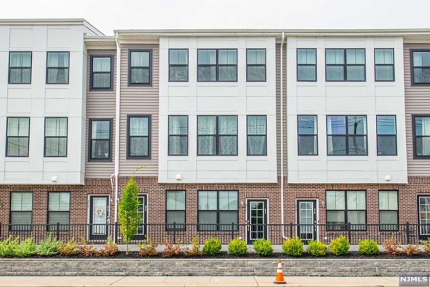 Move right in to this beautiful 2BR, 2FB townhome at The Parke in Little Falls. Built in 2022, this multi-floor unit boasts a spacious open concept first floor with living room, dining room, kitchen and full bathroom. High ceilings and hardwood floors throughout. Kitchen with wood cabinets, stainless steel appliances, and ample storage. Two oversized bedrooms on the second floor with walk in closets and an additional full bathroom. Second floor laundry. Attached garage and driveway space for added convenience. The Parks is located near shopping, major highways and NYC transportation.