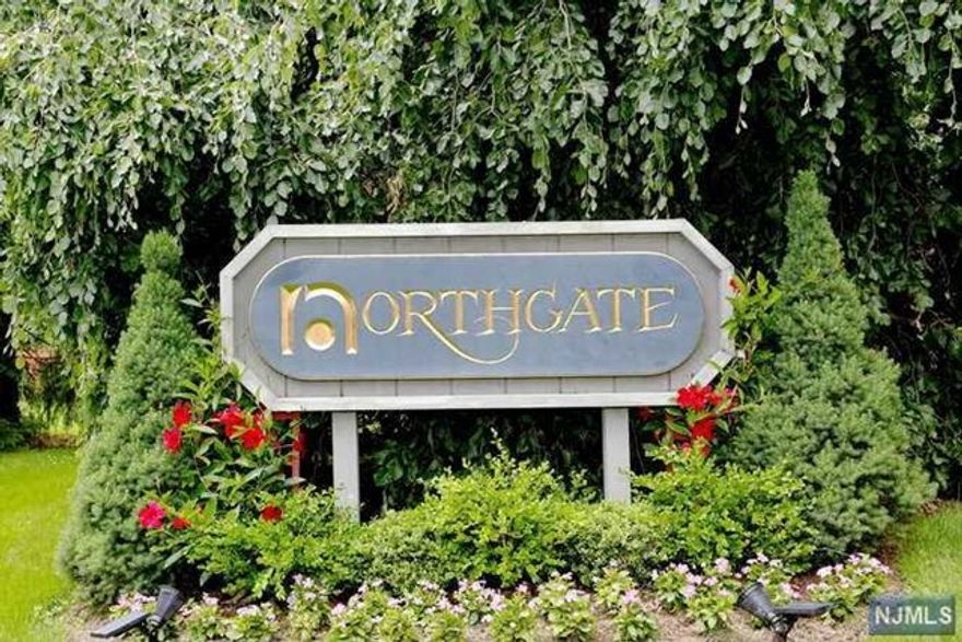 Welcome to this beautifully updated 2-bedroom, 2.5-bathroom townhome located in one of Bergen County's most desirable townhome communities. This home boasts an enviable convenient location close to all amenities. The complex includes a sparkling pool, tennis courts, and a clubhouse for all your recreational needs. Step inside to find an inviting layout featuring large rooms, a newer kitchen with modern finishes, and an exquisite master bath. The other bathrooms have also been thoughtfully updated. Enjoy cozy evenings by the gas-fired fireplace, which features a custom mantle and granite surround. Outside, a private patio provides a perfect space for relaxation or entertaining. Additionally, this home includes a 1-car attached garage for added convenience. Don't miss out on this gem - it truly has it all!