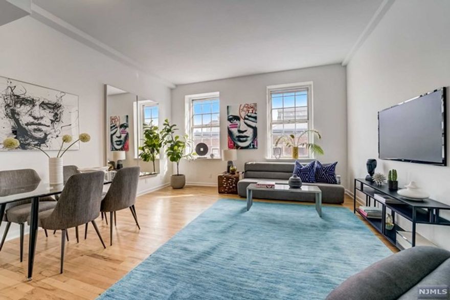 Welcome to the epitome of urban living in the heart of Downtown Jersey City! Located within the historic Dixon Mills community, this 2 bedroom 2 full bath duplex unit with an open layout, where the LR, DR, and kitchen blend, creating the perfect space equipped with large windows allowing for natural light. Fully equipped kitchen features stainless-steel appliances, granite countertops, and a convenient breakfast bar. Renovated full bathroom with stand-up shower. enture upstairs to find two private bedrooms, each offering tranquility and comfort. Primary bedroom showcases a walk-in closet, add'l spacious br with private access to outdoor private terrace with views of NYC and another FB complete upper level. In-unit laundry, central air, and option for parking at an additional fee to add to the convenience.Experience the ultimate urban lifestyle with access Dixon Mills' unparalleled amenities, including an 8000sq ft plus fit center, indoor bball & sauna, 24/7 security, concierge.