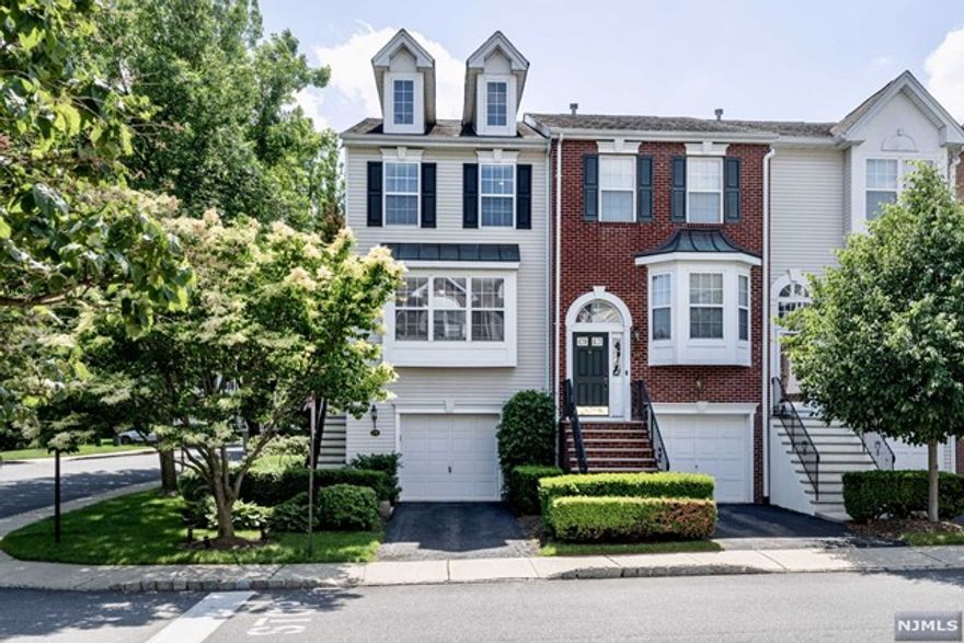 Straight out of a Decorating Magazine! Completely renovated Wexford Model tri-level END UNIT w 1790 sf of living space w 2 BDs 3.5 BAs. Enter into the foyer to the formal LR, new designer Kitchen w Custom Cabinetry, high-end SS appliances & Granite counters opens to the spacious FR/dining area w gas FP. 2nd floor houses both BD, main BA & Laundry. Primary en-suite w spa-like bath is complete w stall shower & heated floors, 2 large WIC outfitted by Cal Closets. Full finished walk-out Lower Level w spacious FR w built-in bar w granite top, wine fridge & reclaimed wood accents, storage closet, updated full BA & entrance to the composite patio w gas grill hook-up overlooking the beautiful lush lawns; Features include HW floors on 2 floors, custom window treatments, AC & Furnace (2012), Hot Water Heater (2021) The complex amenities include an in-ground pool, gym, tennis, playground, walking/biking paths and clubhouse with kitchen for events. This 24 hr gated community.