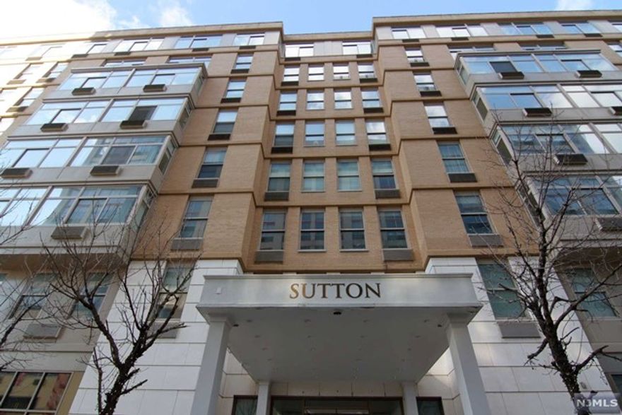 Welcome to The Sutton at Liberty Harbor, a Full Service Building. Bright & Sunny Large 1 Bedroom, 1 Full Marble Bath. Kitchen features Granite Countertops and Upgraded Kitchen Cabinets, SS Appliances, H/W Floors throughout, W/D in Unit. Amenities include Outdoor Pool, BBQ Decks, Jacuzzi, Gym, Playroom, Community Room, Theater, Game Room, full time Concierge. On Site Garaged Parking. Near Restaurants, Parks, Path Station, Light Rail and Ferry to NYC. Call now to schedule a showing.