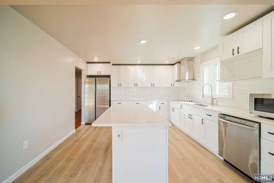 JUST FINISHED TOTAL RENOVATE 3 BEDROOMS AND 2 FULL BATHS. PRIME LOCATION IN PALISADES PARK. NINUTES TO MAJOR HIGHWAYS AND GWB NYC TRANSPORTATION. 1 CAR GARAGE AND 2 PARKING SPACE. ALL NEW APPLIANCES. USE BACK YARD.