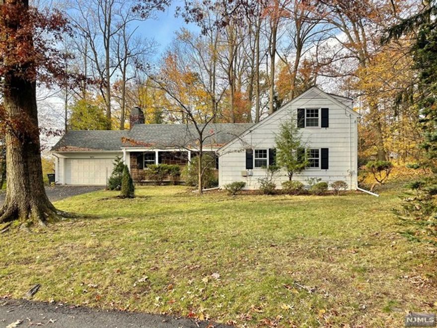 This one family home is located on the beautiful tree lined residential street. Recently renovated home features: large living room w / wood burning fireplace, formal dinning, library, 2 bedrooms and full bath. The second floor has 2 more bedrooms, full bath and long hallway with large closet.Basement is open, with laundry area and lots of space for storage. Gleaming hardwood floors throughout the house. The library door leads to a large deck overlooking semi wooded backyard. Garage is not include in rent.Quiet, cul-de-sac street, close to major highways, transportation, 5 min drive to Montclair State University. No pets allowed.