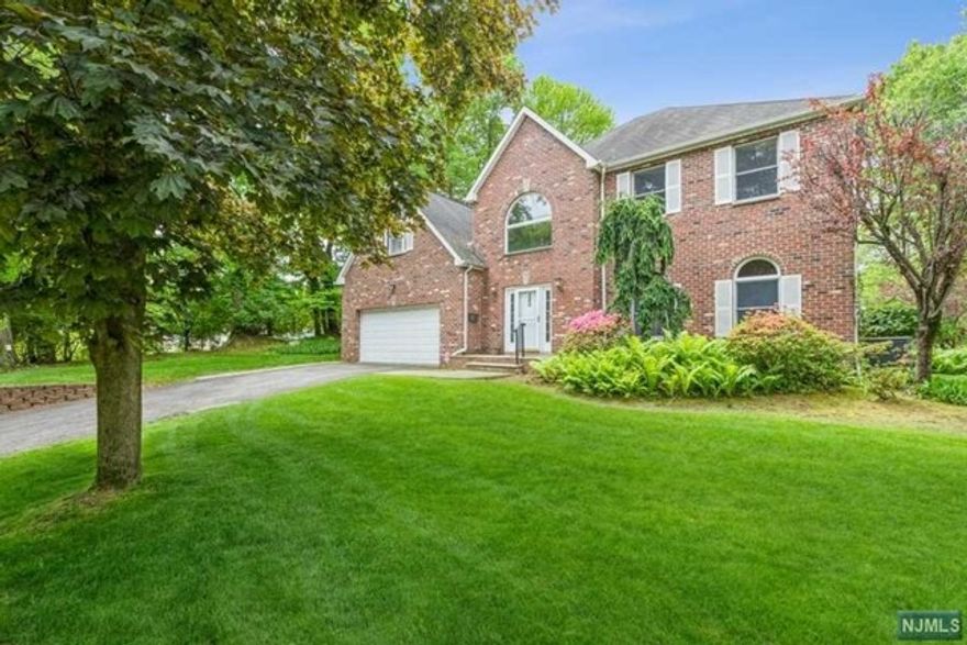 Beautiful and modern Closter home with a fabulous floor plan and a coveted location! Enjoy great light throughout each sun lit room that beams through large windows and off impeccable hardwood floors. Handsome dining room, living room, great room with fireplace, a modern kitchen with breakfast area, sliding hardwood doors that offer easy access to fabulous patio and private, lush and landscaped backyard property. Enjoy luxurious true master suite with spa-like master bath and great walk-in closet space. All additional bedrooms share great hardwood floors and two bathrooms. Second floor also boasts a bonus niche office area. Large basement is partially finished with endless potential for home rec area, gym, whatever one may desire. Great schools, location and close to NYC transportation. Don't miss this one! Landscaping is included in the rent. Snow removal is the responsibility of the tenants. Listing agent is related to owner.