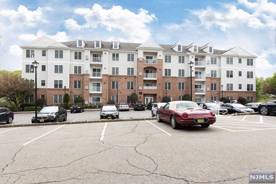 Spacious two bedroom with loft: perfect for a home office, two balconies off living room and Master Bedroom. Stackable washer/dryer. One car garage parking. 4th floor elevator building. Great amenities. Plenty of storage, Tenant to obtain renters insurance policy. 2 clubhouses, 2 pools, tennis courts, fitness center, billiards room and much more!