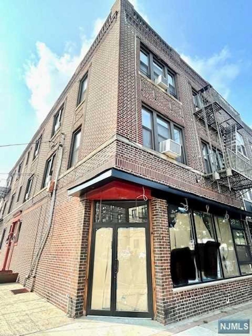 Exceptional Location, in high demand Park Ave. Just a block away from Blvd East and steps away to direct & quick public transportation to NYC, trending restaurants and cafes, schools and shopping. Well kept brick building, 8 residential units, 1 store front plus a 1 car garage. Newer boiler, newer hot water heater. So much potential!! Call for your private viewing today!