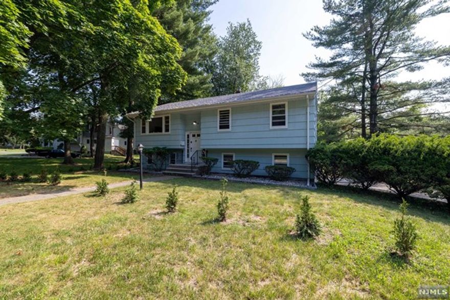 Welcome to this 4-bedroom, 2-full bathroom bi-level Cresskill home offering modern comfort w/timeless charm. On the main level, there are 3 bedrooms, a full bathroom, living room, dining room & renovated kitchen boasting newer state-of-the-art smart appliances. Sliding doors lead to a new deck & a beautiful private yard. The main bathroom is accessible from both the primary bedroom & the hallway, ensuring convenience & privacy. The lower level features an additional bedroom that can double as an office space, accompanied by an updated full bathroom. The family/rec room provides sliders, offering direct access to the backyard. The smart home system includes locks, lights, outdoor/indoor speakers, alarm & security cameras. An underground drainage system w/outdoor sump pump, fresh new grass, new fence, & smart sprinkler system were recently installed. Wifi throughout the house w/high-speed internet is included in the rent. Tenant is responsible for landscaping & snow removal.