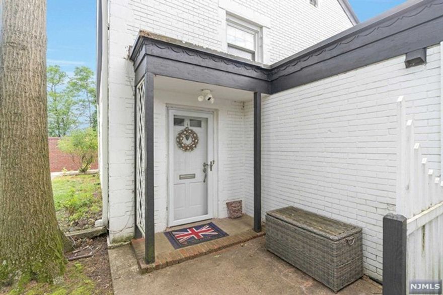 Welcome to a commuter's delight! This unique 2-story cottage-style townhome is in the unique development of only 8 homes, offering a rare blend of charm & convenience with easy access to shops, restaurants, & NYC trains & buses. The sundrenched first floor offers a living room, complete with a coat closet and convenient powder room. Entertain guests in the bright & airy dining room that seamlessly connects to the newly renovated kitchen boasting granite countertops and top-of-the-line appliances. A walk-in pantry houses the water heater and 2 yr. old furnace. Convenient back door access to rear patio & garage. Ascend to the second floor, where a large primary bedroom awaits, featuring 2 custom built closets & a good size bedroom with large closet and laundry. Relax in the newly renovated full bathroom showcasing modern finishes and a thoughtful design. Hardwood floors throughout, high ceilings, and central air, with a 1 car attached garage, this home offers low maintenance living!