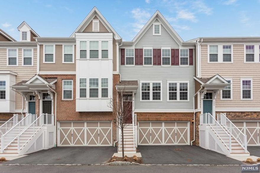 Willow Run is Northern Bergen County's newest luxury townhome community in a sought after location. This Surrey model with a rear extension is the largest unit in the complex. It boasts flexible open concept floor plan with office/den off kitchen and extended family room on the lower level. Many features include all hardwood floor throughout, upgraded gourmet custom kitchen and ex-large island, upgraded porcelain tile in all bathrooms, large walk-in closet, full bath on the ground level for guest suite/family room, 9 ft ceiling, 2 car garage w/additional storage. This unit is located on a quiet spot and very convenient for NYC bus and schools. Don't miss this beautifully upgraded young town home with wonderful floor plan in a renowned school district!