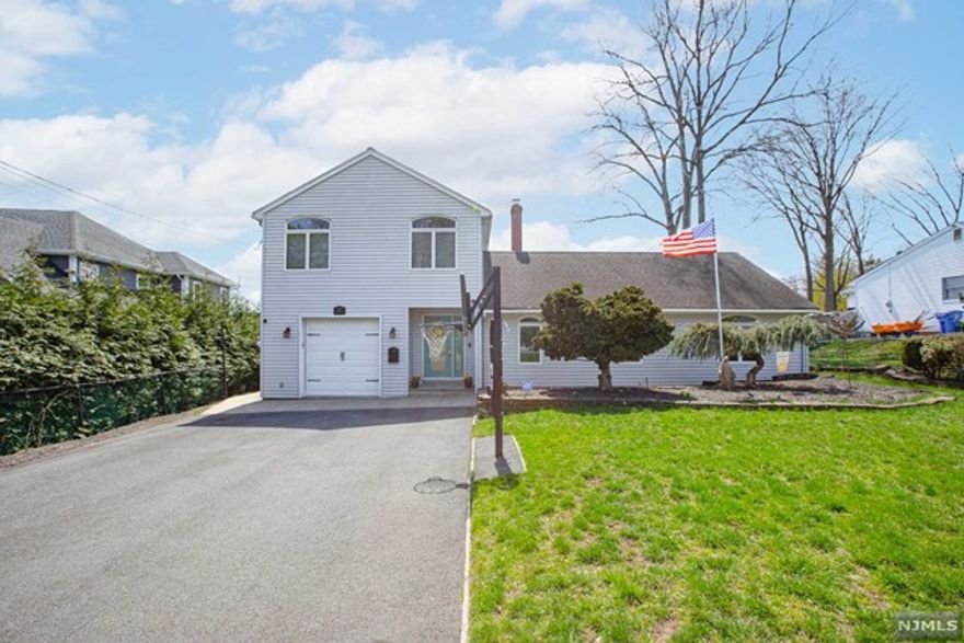 Welcome to this picture-perfect colonial! This well-maintained home sits on a large lot, in a great neighborhood, close to NYC, with excellent schools, incredible malls, and transportation. Tastefully updated, this home features 4 generous bedrooms, 3.5 bathrooms, and an attached oversized heated garage. With mint condition utilities that include a 2-Zone Central Air and 3-Zone baseboard heating, a sprinkler system, and a fully fenced-in yard, this home is truly move-in-ready! This is home is 2,023 square feet. Make an appointment today and become a part of this pristine neighborhood today!