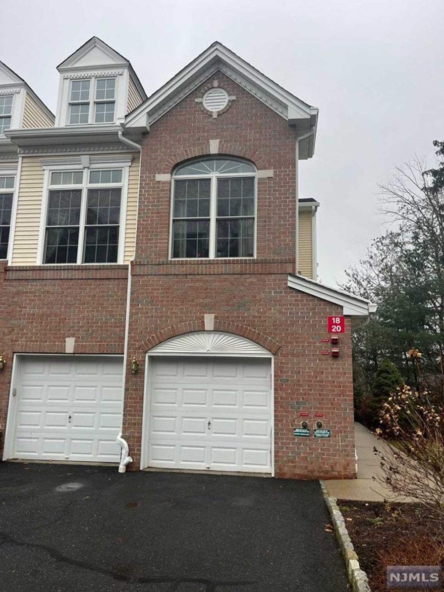 Beautiful end-unit townhome at Lafayette Hills in Hawthorne offers resort-style amenities including pool, clubhouse, gym, and dog run. Updated with 2,255sf living space, it features a balcony kitchen, spacious living room, laundry, full bath on main level. Upstairs, Primary Suite with private balcony, huge walk-in closet, full bath with soaking tub & walk-in shower. Second bedroom with double closet and adjacent full bath. Lower level boasts walk-out basement, private patio, storage area, mechanical room, and high-efficiency heating/central air system. All closets shelved & finished. Upgrades include sound system, central vacuum, water softener. Great schools, close to NYC transportation for easy commute to NY.