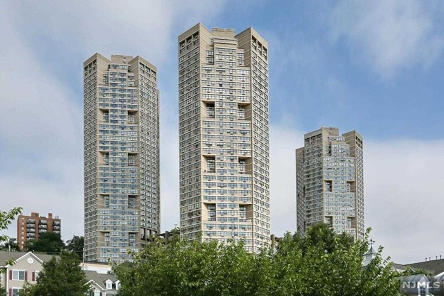 Waterfront NYC facing 2 Bedroom, 2 Full Bath, 1337 Square foot condo in all amenities included Galaxy Towers with stunning views of the Hudson River and the iconic New York City skyline from every window. Modern renovated kitchen (newer cabinets, stainless steel appliances, granite countertops), hardwood floors throughout, central A/C, 24 hour concierge, gym, spa, tennis courts, and indoor and outdoor swimming pools with sweeping views of NYC. Utilities included in HOA except phone, cable, and internet. Pets welcomed. Parking available for additional fee. Public transportation in front of building complex. 15 minutes to Midtown Manhattan.