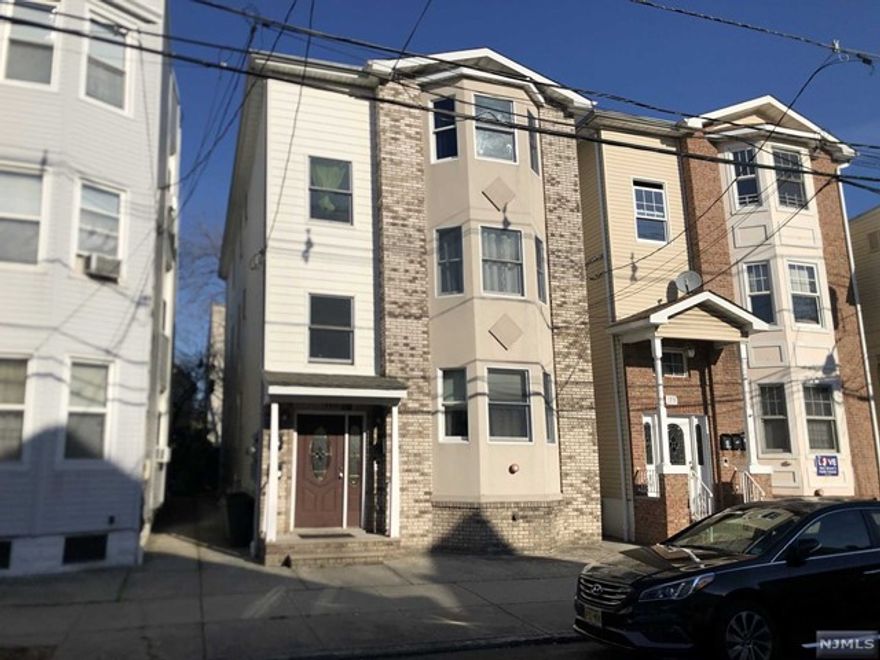 Landlord pays half fee, Tenant only pays half broker fee on this lovely and spacious modern 13 year old, east facing, unit with a total of 7 rooms, 3 bedrooms, 2 full baths, laundry room, storage in basement (middle bin), lovely hardwood floors, common use of yard. Includes dishwasher, refrigerator, washer & dryer. Located on 3rd floor, tenant supplies own gas forced air heat, central air, cooking gas and electric. No pets, no parking, no smoking of any kind in unit or dwelling. Approx 2 blocks to bus stops: NJ Transit# 38 & 76 to Newark Penn Station and EZ Ride bus 232 to PATH 1 year lease, 1.5 months security. Landlord requires rental application for all adults, full acceptable credit report and proof of ability to pay.