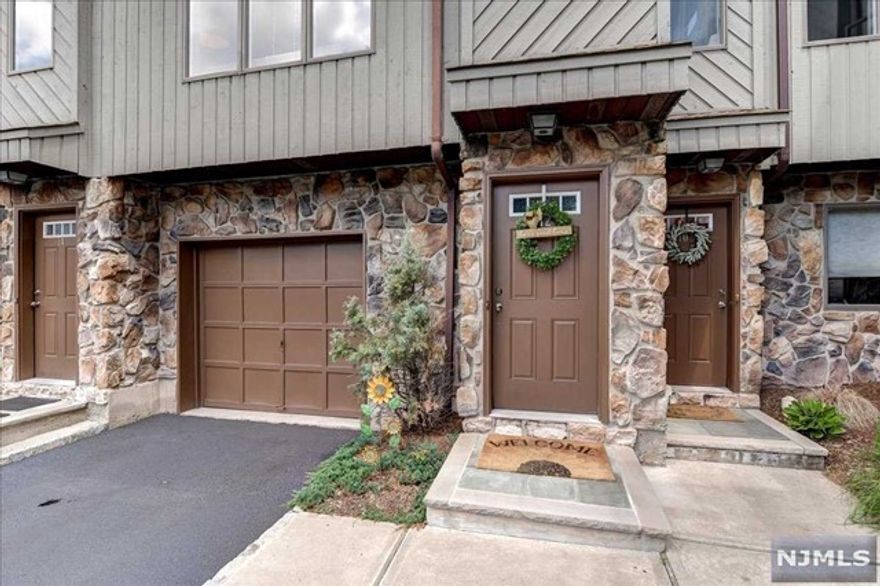 Welcome to Hamilton Gardens - a small and peaceful townhouse community nestled in the highly desirable Fairmount Section of Hackensack N.J. Pull into the attached garage and enter to the ground level where you will find the perfect den/office space along with the first of 3!! full bathrooms that this home has to offer. Off of this useful bonus room you will find a fenced-in patio with plenty of space to entertain your guests in the warm months! Head up the flight of stairs to the main level of living space which includes a very large living room, dining area, powder room, and your beautiful Chefs Kitchen that has a ton of cabinet space, a useful Butcher Block Island, big pantry, and even a wine fridge! Going upstairs to the top level you will find the primary bedroom complete with its own full bathroom! A second large bedroom and hall bathroom finish off the top floor. Close to trains, buses, and restaurants/shops, the location is second to none!! Don't miss this tremendous home!