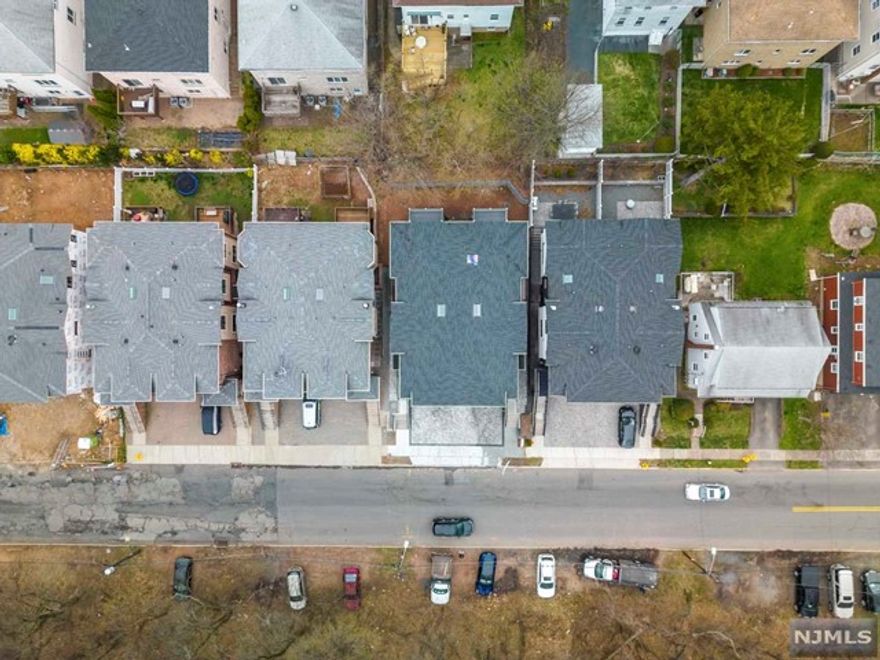 NEW CONSTRUCTION DUPLEX! - 3 Bedrooms, 3 full baths, 1 half baths, 2 car garage. The ground level features a Family room w/full bath, and a room, perfect as an office or 4th bedroom, with side access to the yard. The 1st level features a large living room w/fireplace, separate dining room, modern kitchen w/ large center island, double oven, top of the line appliances, powder rm & sliders to balcony. The 2nd level has a primary suite w/full bath a 2 walk in closets 2 more bedrooms, a full bath & laundry room. Located near shopping, NYC trans and major highways for easy commute, great schools and a wonderful community makes this the perfect home for your family. Owner holds Real Estate license. Completion date April 2023