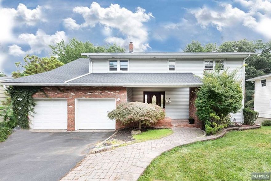 Large 4 Bedroom Colonial located on a cul-de-sac in a quiet residental neighborhood. Master Bedroom with Walk-in Closet and Master Bath, 3 additional nice size bedrooms and full bath. Full Finished Walk-out Basement with Large Open Room, Office and 0.5 Bath, Deep Back Yard. Covered Front Porch, Large Rear Deck, Fresh paint, 2-Car Garage, easy access to shopping and major thorofares.