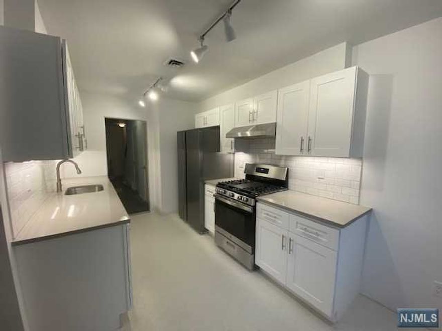 Large, modern updated 3 bedroom, 1.5 bathroom townhouse. Spacious finished basement. Laundry in unit. Outdoor yard space. Short walk to train station. Great for commuters. Street parking . Heat and hot water are paid by tenant. Good credit, income, no smoking. Well behaved pets are welcome. 1 month rent, 1 month security deposit and 1 month broker's fee. Water included.