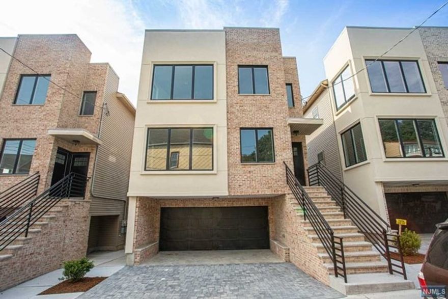 2019 BUILTED OVER SIZE TOP AND BOTTOM 2 FAMILY HOUSE.3BED 2BATH ON 2ND FL. OPEN KITCHEN WITH EXTRA LARGE ISLAND. NEW GRANITE COUNTERTOP AND S.S APPLIANCES. ALL HARDWOOD FLOOR , 9" HIGH CEILING. 2CAR GARAGE & DRIVEWAY. CLOSE TO SHOPS, RESTAURANTS &TRANSPORTATION ,GREAT LOCATION NEAR 49 ST LIGHT RAIL STATION TO NYC.