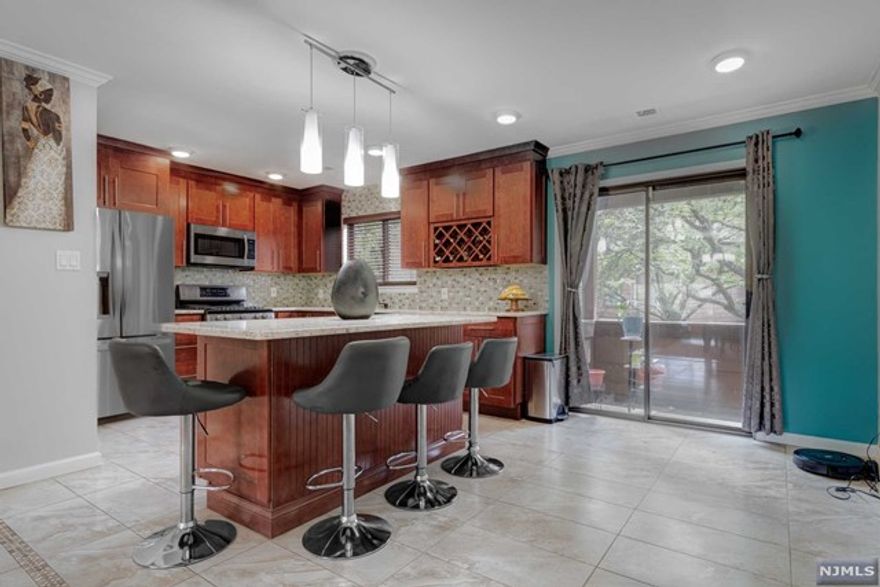 Nestled in the heart of Secaucus in a gated community w/ 24 hrs security, this contemporary twnhs is fully renovated w/ premium mtrls. Over 1450 Sq Ft, 2 bdrms, 2.5 baths duplex (Falmouth) w/ 2 Walk-out terraces & breathtaking riverviews! 1st floor consists of an open concept living room w/ fireplace, formal dining rm, powder rm, laundry area & Eat-in Kitchen! Oversized kitchen featuring custom soft-close cabinets w/ quartz countertop, stunning backsplash, SS appliances, Turkish porcelain floor tiles & a large center island! Venture upstairs to your Master bedrm suite w/ full bath, w/ marble-topped sink, great closet space, 2nd bdrm & a 2nd full bath. Driveway- 3 cars incl a carport for the 1st car, Addl storage rm at the prkg level! 4 miles of paved scenic trails, brdwlk & private kayak marina add to this luxury resort style amenities - pool w/ bar/cafe, tennis/bb courts, clubhouse, playground. Easy commute to NYC, NJ Trnpk, GS Prkwy, Lincoln Tunnels, GW Bridge, & airports