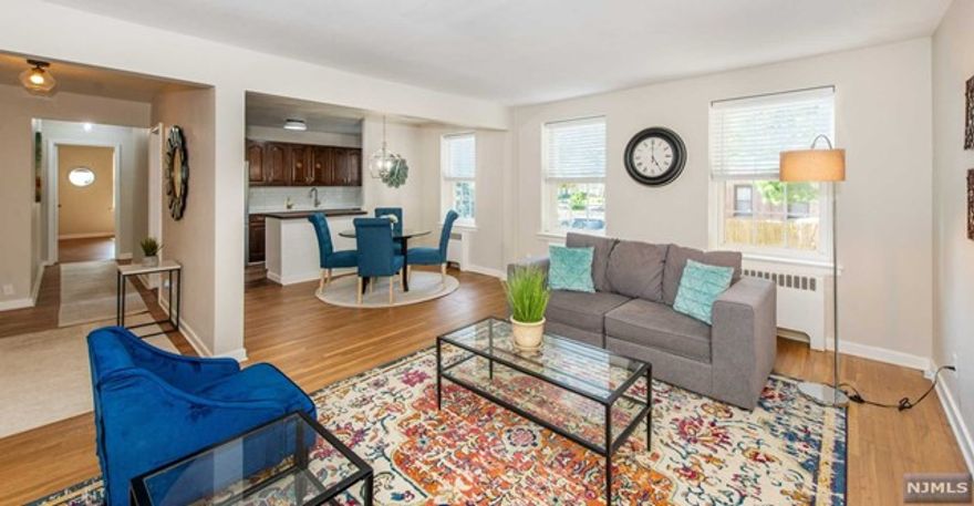 Perfect for a 1st time homebuyer or downsizer looking to stay in the area, this 1st FL condo located in the quiet Kip's Farm Section of Rutherford is the unit for you. Newly renovated 816 Sqft 1st floor condo with just the right mixture of old time character & some modern amenities As you walk through the door your are welcomed by the newly refinished hardwood floors, open layout, & the brightness of a corner unit with the sunlight beaming through your windows. Newly refreshed kitchen with plenty of cabinets, stainless steel appliances, quartz countertop & subway tile backsplash & butcher block breakfast bar make it a clean &fresh way to prepare your favorite meals. Nice size BR with 2 generous sized closets w/mirrored doors, bamboo shades & ceiling fan. Newer Frigidaire quiet wall AC's.Basement door right outside unit for easy access to the laundry & large storage unit. Heat & hot water included. Steps to NYC Bus,8 blocks to train & Rutherford's amazing downtown! Not to be missed