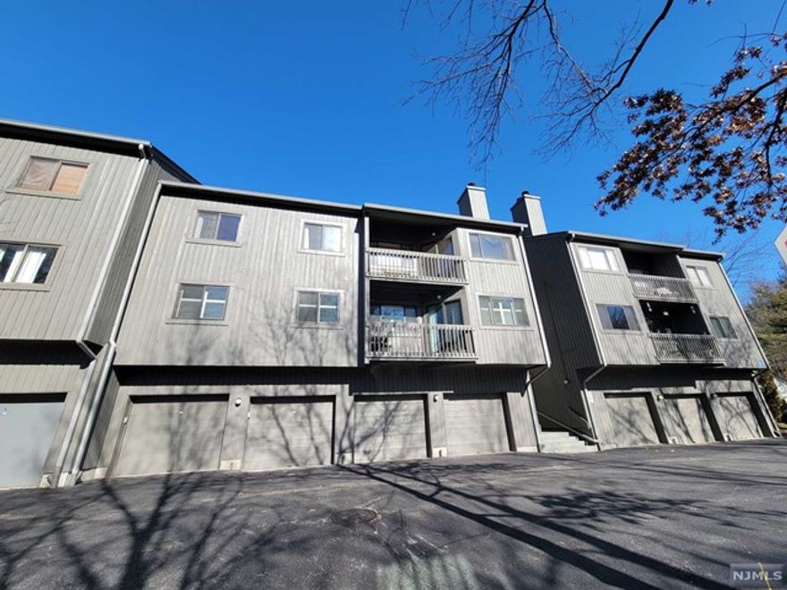 South-facing bright & spacious unit with open floor plan, high ceilings, hardwood floors, fireplace & a nice balcony. Entrance for this unit is on 3rd floor. Main level offers huge primary suite (w/ walk-in closet and full bath), second bedroom, full bath, kitchen, laundry and plenty of closet space. Second level offers huge loft area (recreation room), additional bedroom/office and full bath. Unit comes with oversized garage w/ storage space. Great location for NYC bus or train commuters. School bus picks up at the community. Highly ranked schools. Timber Valley is a quiet wonderful community with pool and BBQ areas. Located close to shops and train station or bus.