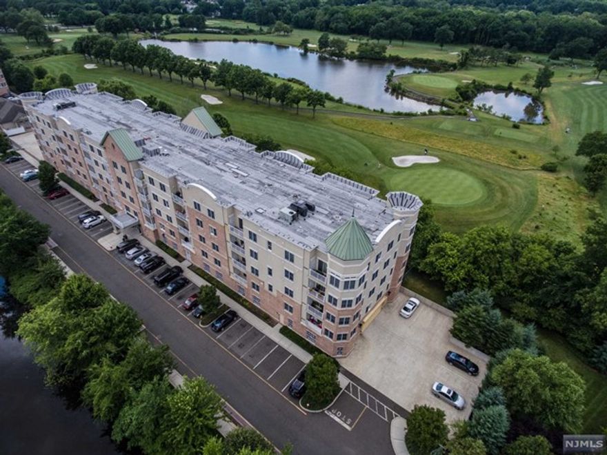 Beautiful luxury condo in desirable location with Bright East south view through large windows, kitchen with cherry wood cabinet, granite counter top with an adjoining dining area & GE profile stainless steel appliances. The Living room is enhanced by a 9 foot ceiling, 1183 sqft. and sliding glass doors to an outdoor terrace. Wood floor through out except master bedroom. His/Her walk-in closet, Master bath with double sink, separate glass shower, granite & marvel floor. Both rooms are facing east. Plenty of visitor parking spots. Club House with a fireplace, kitchen/party area, gym and relaxing room. Direct access from Rt. 4 and 5 min. driving distance to G.W.Bridge. Close to I-80 & I-95. Also close to bus stop to NYC on the Grand Ave. and Rt. 4 front of Complex.