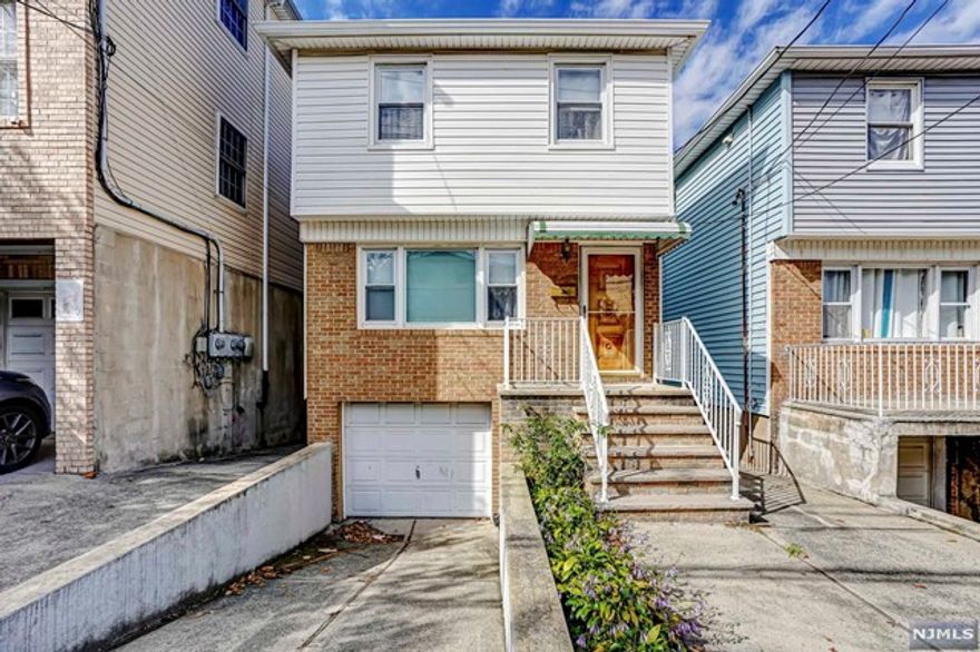 Single family home located on the Western Slope of the Heights. First floor features open floor plan with newly renovated gourmet kitchen, living room, dining room and half bathroom. Second floor offers three bedrooms with full size bathroom. Basement is unfinished w/ high ceilings, laundry and lots of storage space. Private one car garage. Bi-level backyard for entertaining and watching sunsets. Hardwood floors throughout the home and central A/C.