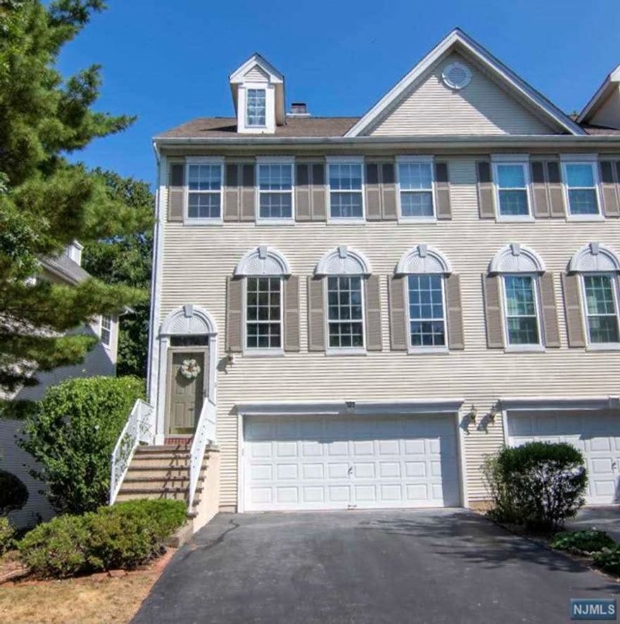 Welcome to "Stonebridge," located in the desirable Hills section of Wayne, NJ., known for its top rated school system, proximity to restaurants, suburban shopping (close to new Trader Joe's and Shoprite), and NYC transportation. The School bus stop is located just outside of the front door! Living is easy in this 4 bedroom, 2.5 bath townhome. You'll find a large master bedroom suite with W.IC, second floor laundry room, updated SS appliances, hardwood floors on the main level and a huge 2 car garage. This home also includes new water heater, oversized A/C unit, abundant natural light and a 300 sf ultra private deck, perfect for entertaining and family BBQ's. Pets are welcomed. Don't wait.....this one won't last!