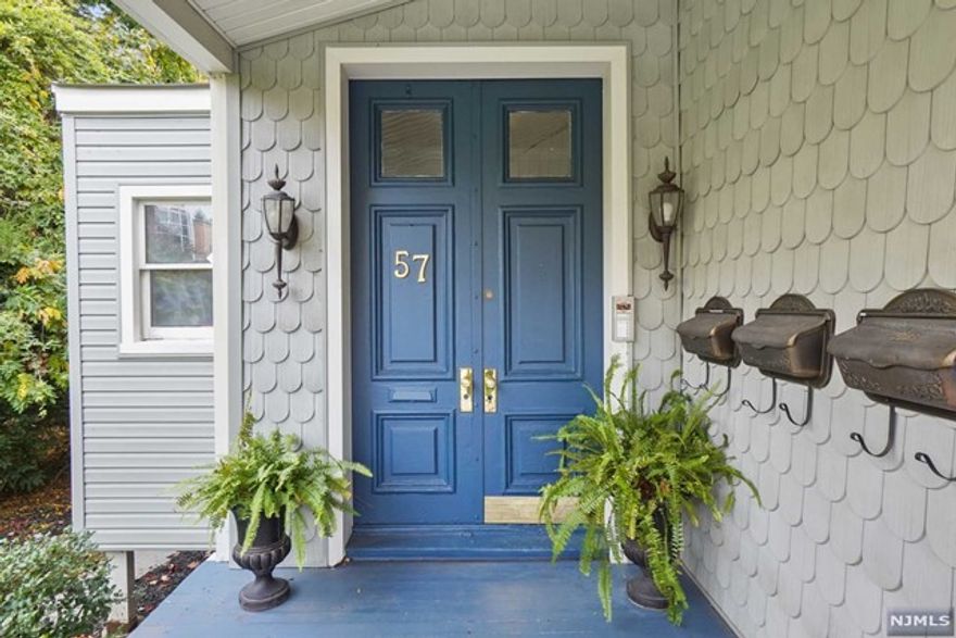 This location cannot be beat! Blocks to all that downtown Montclair has to offer. This converted Victorian gem has all the charm of a house with the convenience of condo living. Enter this second floor unit to find beautiful high ceilings, large crown moldings and original hardwood floors. The sun-filled living room features bay windows and a charming decorative fireplace. The flow from the living room into the large dining room provides a wonderful space for entertaining. The spunky, eat-in- kitchen has updated cabinetry and appliances. Take advantage of this flexible floor plan by creating work from home office and/or play space. The two spacious bedrooms feature in total three walk-in closets and a balcony. You have to experience this unit in person to feel just how special it is.